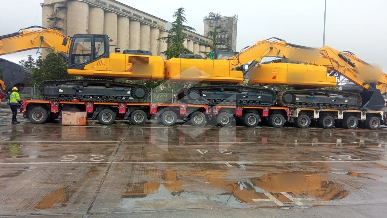Crawler excavators on a lowbed trailer
