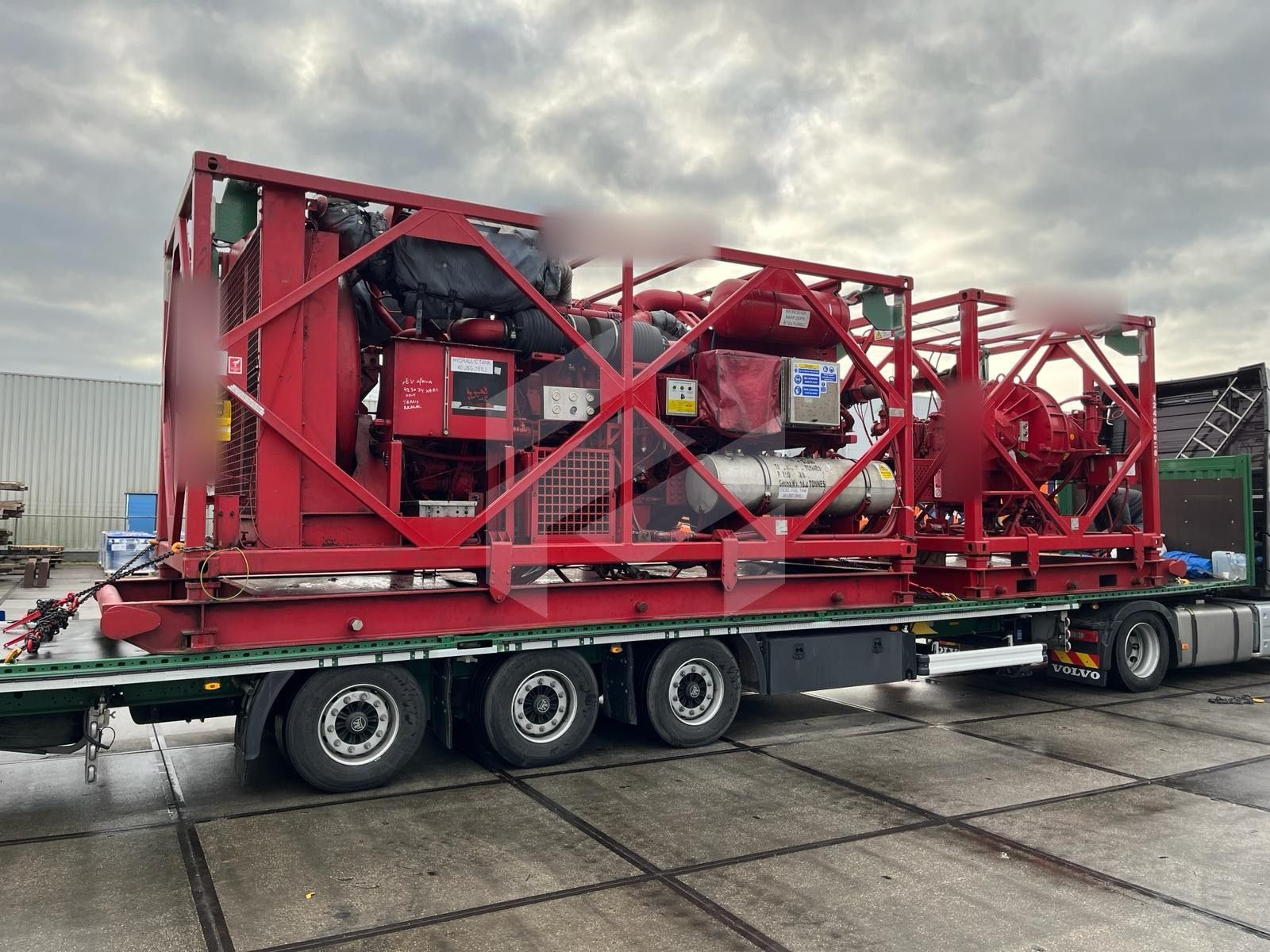 Red-framed oilfield equipment on a trailer