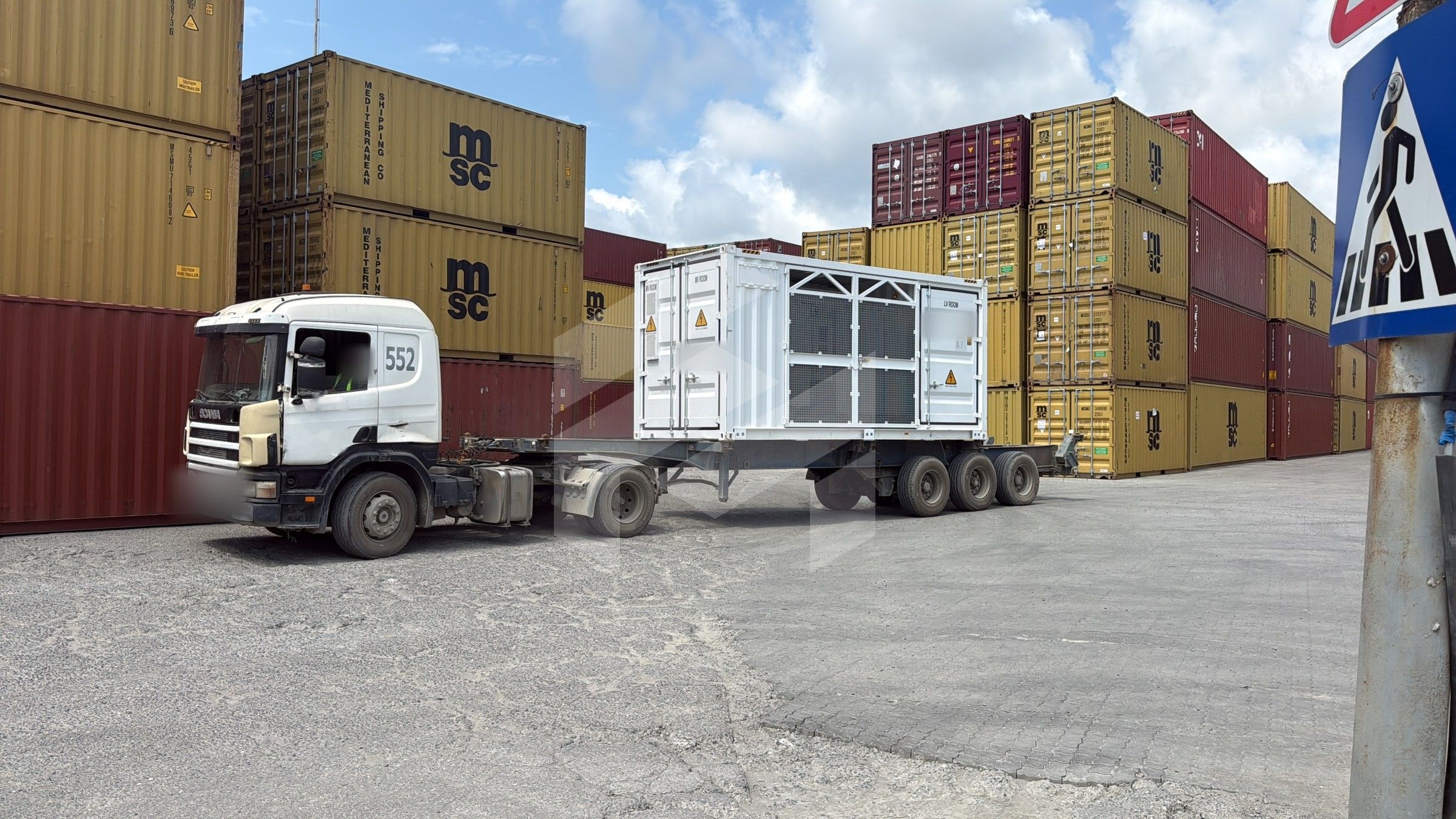 A power pack unit for the Shafag solar power plant on a truck in a container yard